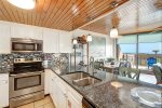 Custom cabinets, granite counters, stainless steel appliance package...and ocean views